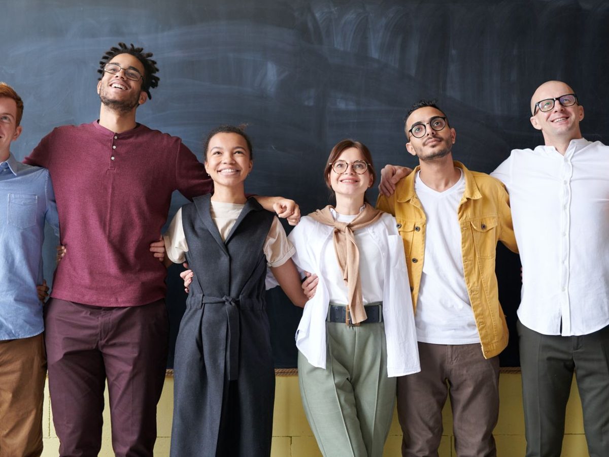 Nonprofit staff and volunteers standing together